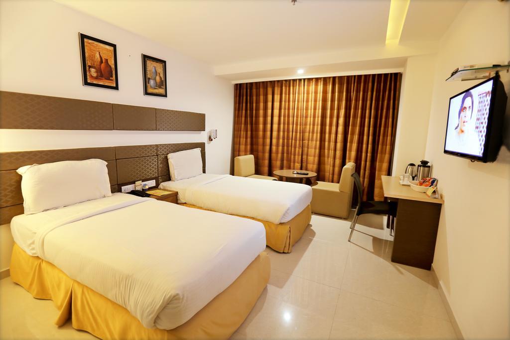 Hotel Sitara Grand Miyapur Haydarabad Oda fotoğraf